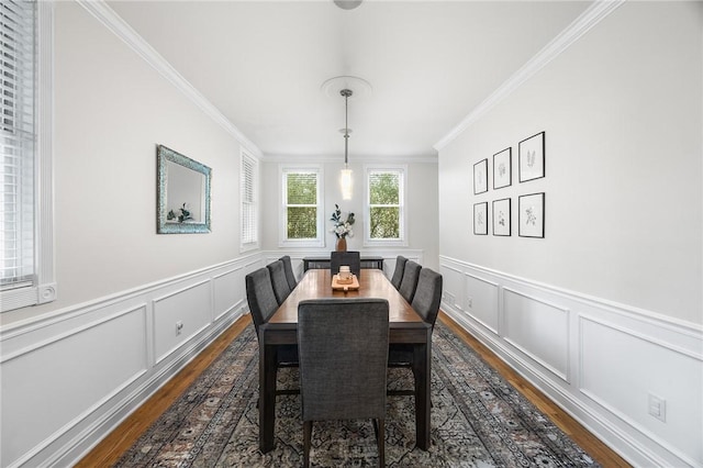 230 Summerlawn Dr, Bell Acres, PA 15143 - dining area with dark wood-style flooring, ornamental molding, a decorative wall, and a wainscoted wall