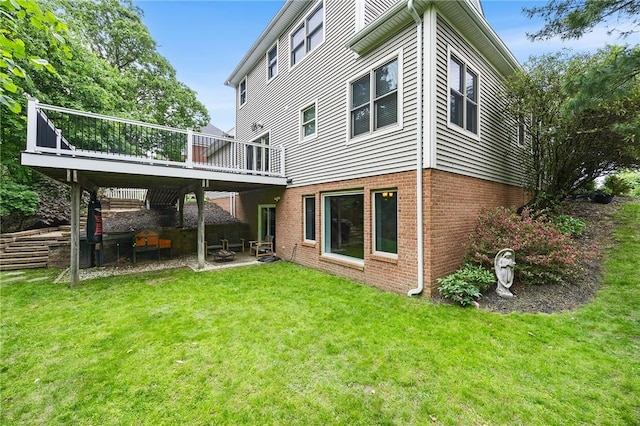 230 Summerlawn Dr, Bell Acres, PA 15143 - back of property with brick siding, a lawn, a deck, and a patio area