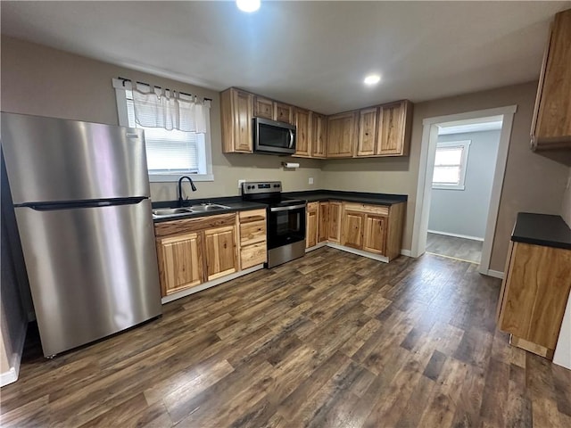 1081 Dixon Rd, Cherryhll Twp/Clymer, PA 15728 - kitchen featuring stainless steel appliances, a sink, dark countertops, dark wood-type flooring, and healthy amount of natural light