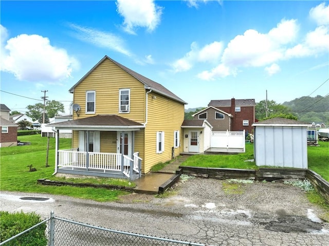 848 7th St, Verona, PA 15147 - rear view of house featuring a porch