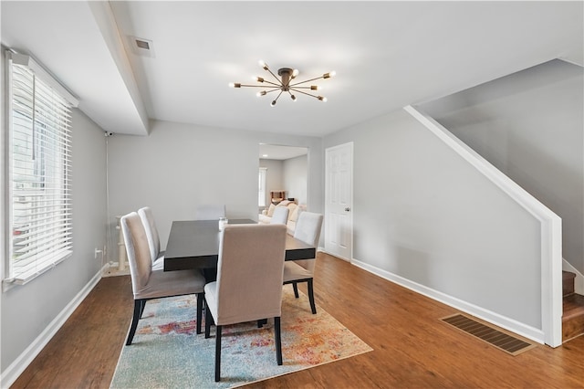 848 7th St, Verona, PA 15147 - dining room with a chandelier, plenty of natural light, and wood finished floors