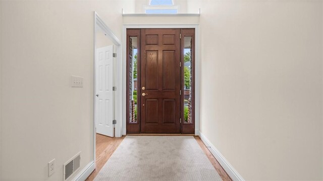 203 Providence Ct, Adams Twp, PA 16059 - entrance foyer featuring light wood finished floors and baseboards