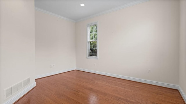 203 Providence Ct, Adams Twp, PA 16059 - empty room featuring wood finished floors, baseboards, and ornamental molding