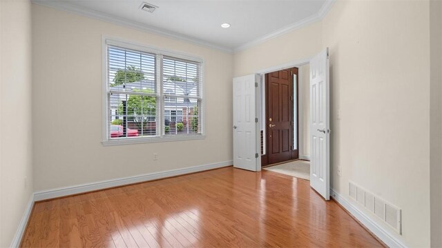 203 Providence Ct, Adams Twp, PA 16059 - foyer entrance with light wood-style flooring, crown molding, and baseboards