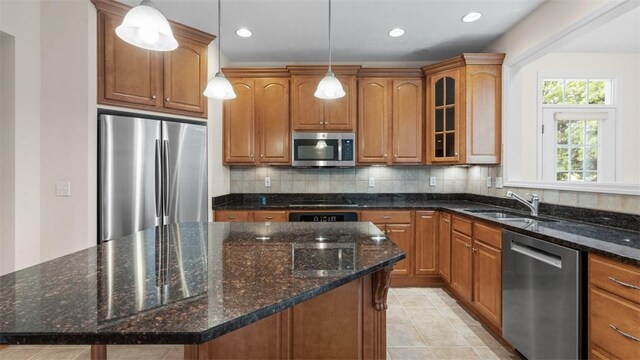 203 Providence Ct, Adams Twp, PA 16059 - kitchen with appliances with stainless steel finishes, a sink, glass insert cabinets, decorative backsplash, and brown cabinets