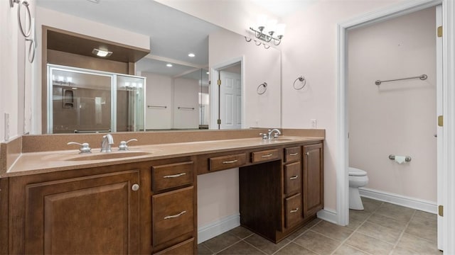 203 Providence Ct, Adams Twp, PA 16059 - bathroom featuring double vanity, a shower stall, toilet, and tile patterned flooring