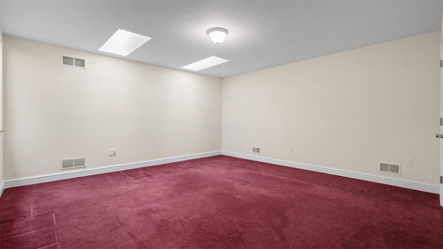203 Providence Ct, Adams Twp, PA 16059 - carpeted empty room featuring a skylight and baseboards