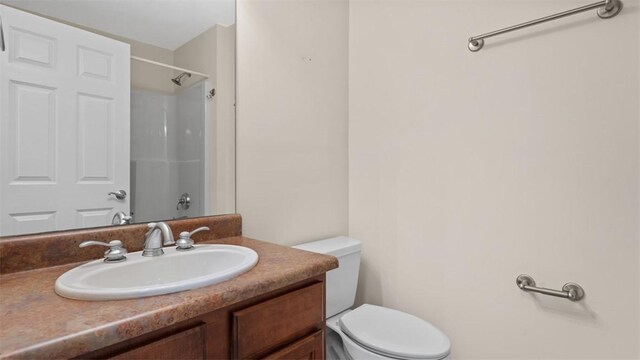 203 Providence Ct, Adams Twp, PA 16059 - bathroom with toilet, vanity, and a shower