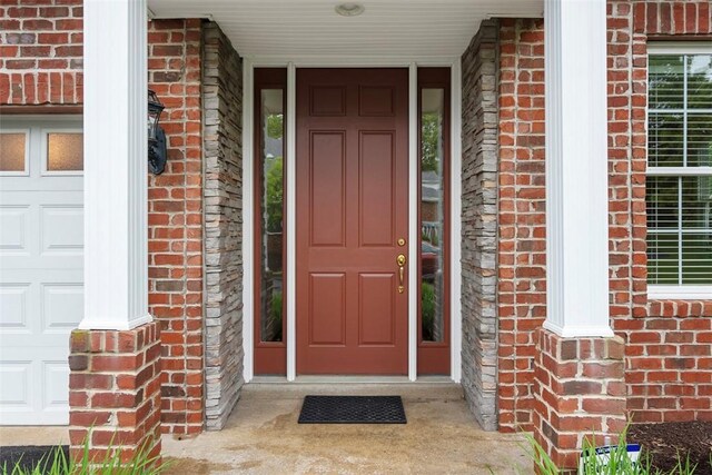 203 Providence Ct, Adams Twp, PA 16059 - property entrance with brick siding and a porch