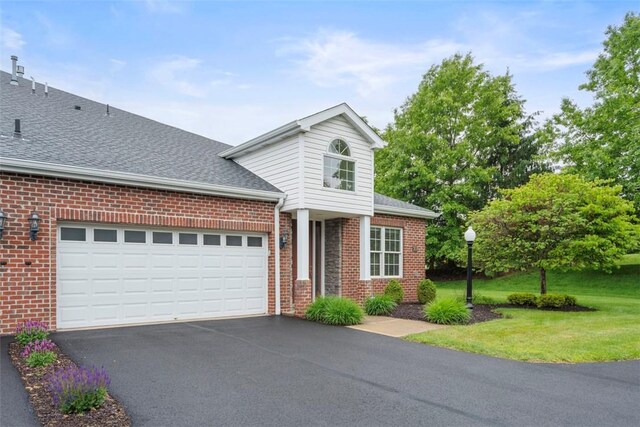 203 Providence Ct, Adams Twp, PA 16059 - traditional-style house featuring brick siding, asphalt driveway, an attached garage, a front yard, and a shingled roof