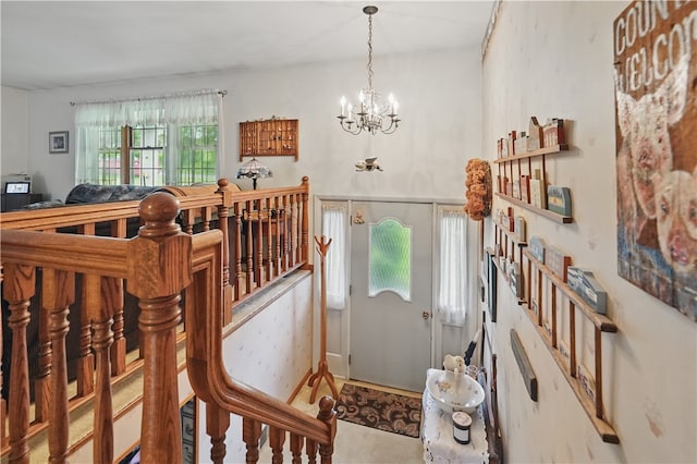 146 Tower Ln, Daugherty Twp, PA 15066 - foyer featuring a chandelier