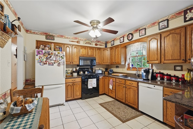 146 Tower Ln, Daugherty Twp, PA 15066 - kitchen featuring white appliances, brown cabinetry, and a sink