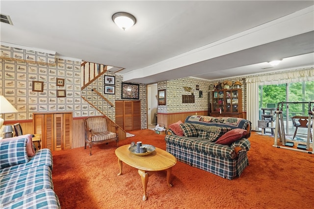 146 Tower Ln, Daugherty Twp, PA 15066 - carpeted living area featuring wallpapered walls, wainscoting, stairway, and wooden walls