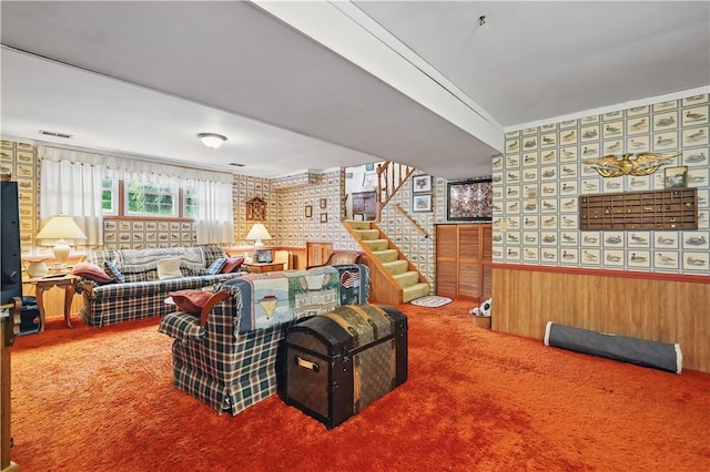 146 Tower Ln, Daugherty Twp, PA 15066 - living room with carpet flooring, stairs, and wood walls