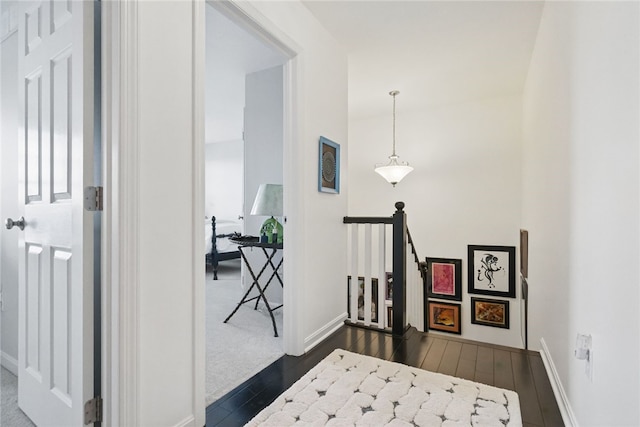 518 Carvine Ct, Marshall, PA 15090 - corridor featuring an upstairs landing, dark wood-style flooring, and baseboards