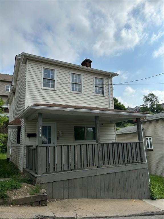 273 Albert St, Mt Washington, PA 15211 - view of front facade featuring a porch and a chimney