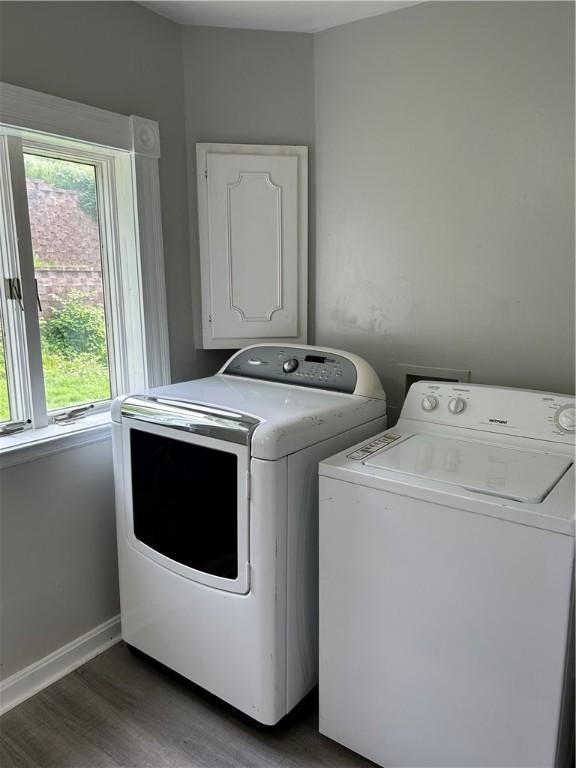 273 Albert St, Mt Washington, PA 15211 - laundry room with washer and dryer, wood finished floors, plenty of natural light, and baseboards