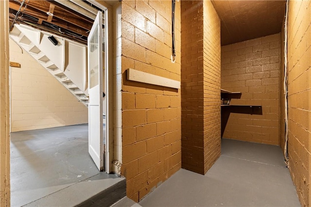 2352 Edgar St, Carrick, PA 15210 - unfinished below grade area with concrete block wall and stairway