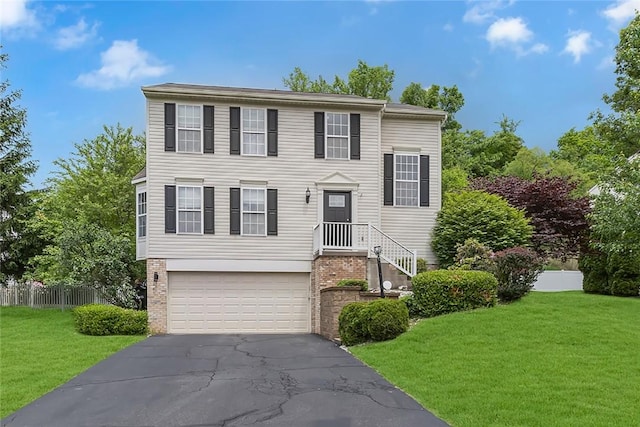 6023 Hawthorn Dr, Moon/Crescent Twp, PA 15108 - view of front facade featuring driveway, an attached garage, and brick siding