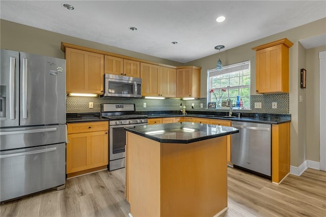 6023 Hawthorn Dr, Moon/Crescent Twp, PA 15108 - kitchen featuring appliances with stainless steel finishes, light wood-style floors, dark countertops, and recessed lighting