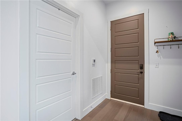 622 Gross St Unit 104, Bloomfield, PA 15224 - entryway with baseboards and dark wood-type flooring