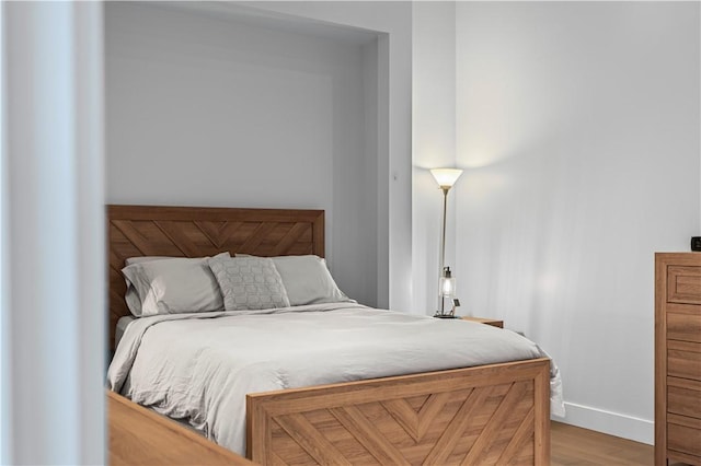 622 Gross St Unit 104, Bloomfield, PA 15224 - bedroom featuring baseboards and wood finished floors