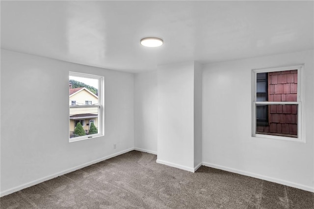 623 E 3rd Ave, Tarentum, PA 15084 - carpeted empty room with baseboards
