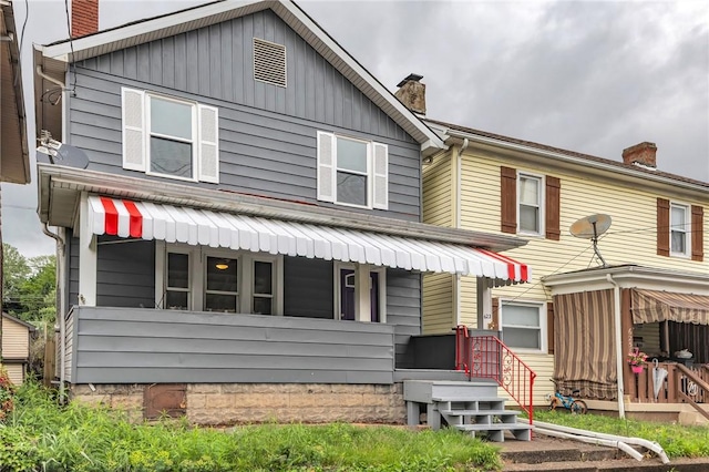 623 E 3rd Ave, Tarentum, PA 15084 - view of front of home with a chimney