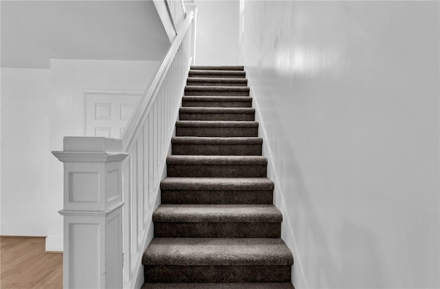 623 E 3rd Ave, Tarentum, PA 15084 - staircase with wood finished floors and baseboards