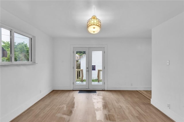 623 E 3rd Ave, Tarentum, PA 15084 - unfurnished room featuring wood finished floors and baseboards