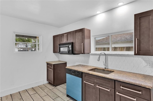 623 E 3rd Ave, Tarentum, PA 15084 - kitchen featuring dishwashing machine, a sink, dark brown cabinets, decorative backsplash, and black microwave