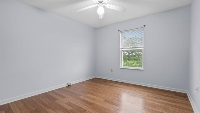215 Mountain Dr, Carnegie, PA 15106 - spare room with wood finished floors, baseboards, and ceiling fan