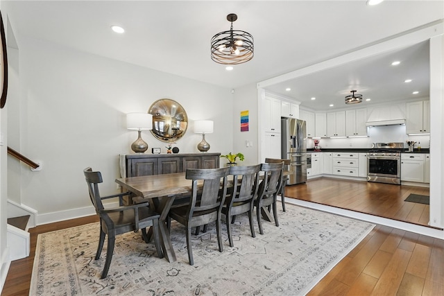 914 James St, East Allegheny, PA 15212 - dining room with wood-type flooring, recessed lighting, and baseboards