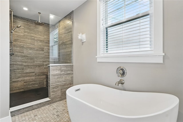 914 James St, East Allegheny, PA 15212 - full bath with a stall shower, a soaking tub, tile patterned floors, and recessed lighting