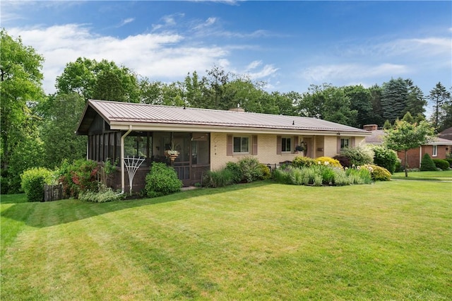 407 Neola Cir, Ross Twp, PA 15237 - ranch-style home with a sunroom, a front lawn, brick siding, metal roof, and a chimney