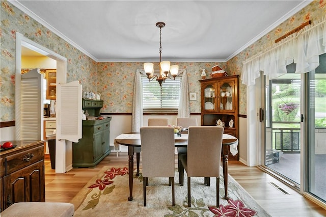 407 Neola Cir, Ross Twp, PA 15237 - dining room featuring wallpapered walls, a chandelier, light wood-style floors, and crown molding