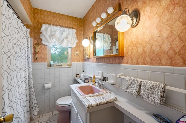 407 Neola Cir, Ross Twp, PA 15237 - bathroom featuring wallpapered walls, toilet, vanity, tile walls, and tile patterned floors