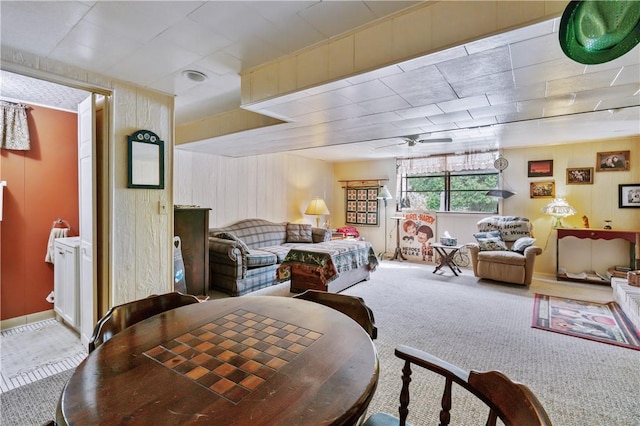 407 Neola Cir, Ross Twp, PA 15237 - dining room with a ceiling fan, carpet, and wood walls