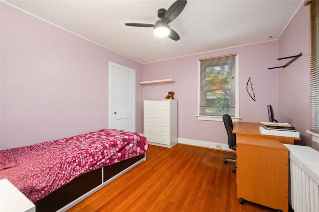 2323 Tilbury Ave, Squirrel Hill, PA 15217 - bedroom with wood finished floors, baseboards, a ceiling fan, and a desk