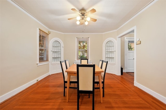 2323 Tilbury Ave, Squirrel Hill, PA 15217 - dining area featuring crown molding, ceiling fan, wood finished floors, and baseboards
