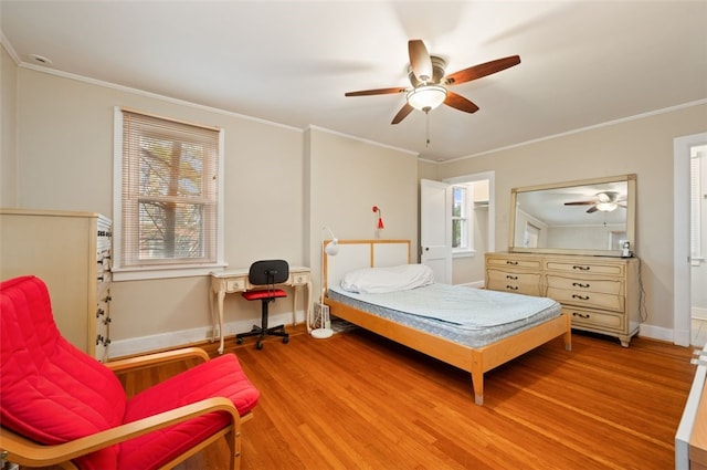 2323 Tilbury Ave, Squirrel Hill, PA 15217 - bedroom with light wood-style flooring, crown molding, baseboards, and a ceiling fan