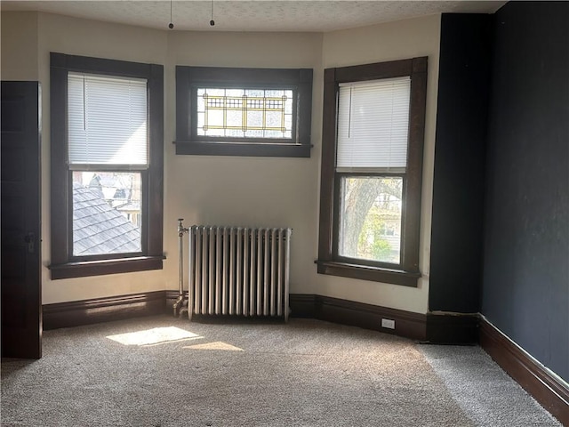 150 Euclid Ave, Sharon, PA 16146 - carpeted spare room featuring radiator heating unit and baseboards