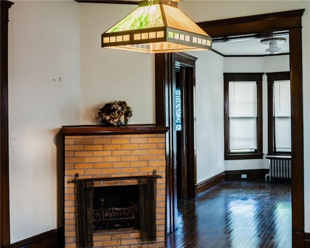150 Euclid Ave, Sharon, PA 16146 - unfurnished living room with hardwood / wood-style flooring, a fireplace, and radiator
