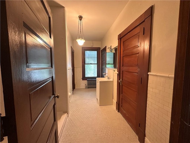 150 Euclid Ave, Sharon, PA 16146 - hallway featuring radiator heating unit and wainscoting