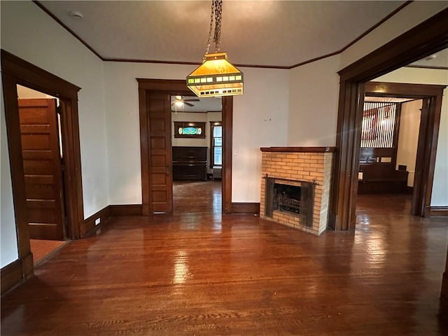 150 Euclid Ave, Sharon, PA 16146 - unfurnished dining area featuring a fireplace, wood finished floors, and ornamental molding