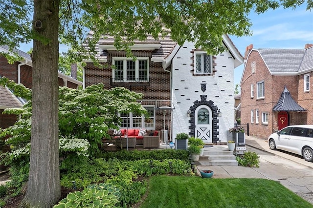 1437 Browning Rd, Highland Park, PA 15206 - view of front of property featuring an outdoor living space and brick siding