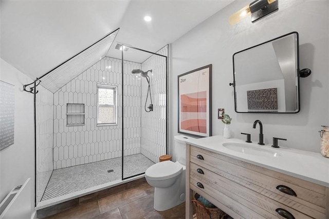 1437 Browning Rd, Highland Park, PA 15206 - bathroom featuring toilet, a stall shower, vanity, and lofted ceiling