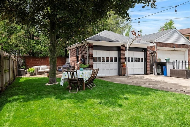 1437 Browning Rd, Highland Park, PA 15206 - view of yard featuring a garage, an outdoor structure, and an outdoor hangout area