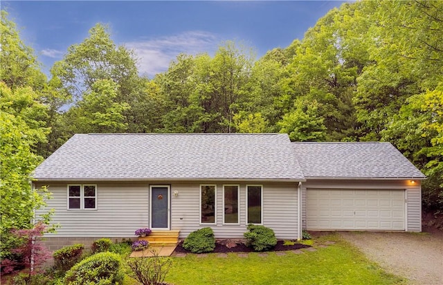 1860 Washington Rd, Washington Twp Wml, PA 15613 - ranch-style house featuring an attached garage, driveway, a front yard, roof with shingles, and entry steps