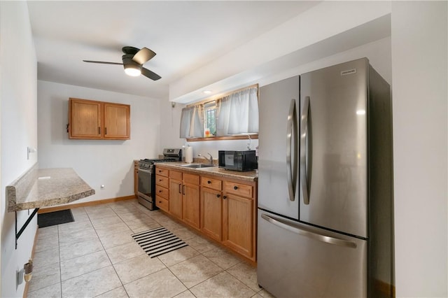 3261 Central Ave, Brighton Heights, PA 15212 - kitchen featuring appliances with stainless steel finishes, a sink, ceiling fan, light countertops, and light tile patterned floors